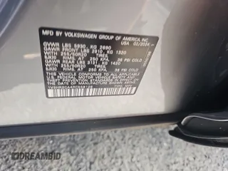 2024 Volkswagen Atlas SE z VIN 1V2HR2CA4RC558128, wystawiony jako IAAI lot #42852874 z przebiegiem 23 623 mil mil oraz . Historia ofert i sprzedaży dostępna na DreamBid. Obrazek 5.