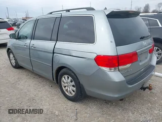 2008 Honda Odyssey EX-L with VIN 5FNRL38748B045957, listed as a IAAI auction lot 41885593 with 212,799 mi miles. Bid and sale history available at carsss.com. Image 3.