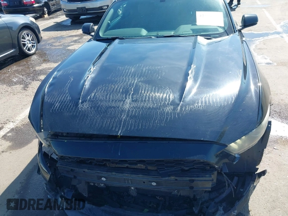2015 Ford Mustang EcoBoost z VIN 1FA6P8TH4F5377048, wystawiony jako IAAI lot #42234256 z przebiegiem 160 455 mil mil oraz . Historia ofert i sprzedaży dostępna na DreamBid. Obrazek 18.