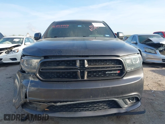 2015 Dodge Durango R/T with VIN 1C4SDHCT8FC833943, listed as a IAAI auction lot 41898447 with 209,999 mi miles and . Bid and sale history available at DreamBid. Image 12.