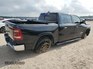 2019 Ram 1500 Laramie with VIN 1C6SRFJT4KN521147, listed as a Copart auction lot 54108615 with 152,888 mi miles and Salvage title. Bid and sale history available at DreamBid. Image 3.