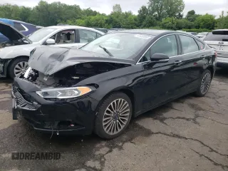 2017 Ford Fusion SE with VIN 3FA6P0T97HR127300, listed as a Copart auction lot 61032055 with 129,776 mi miles and Salvage title. Bid and sale history available at DreamBid. Image 1.