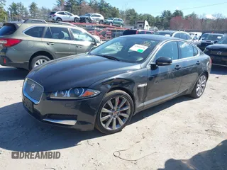 2014 Jaguar XF V6 SC with VIN SAJWJ0EF9E8U31032, listed as a IAAI auction lot 42046036 with 118,927 mi miles. Bid and sale history available at carsss.com. Image 2.