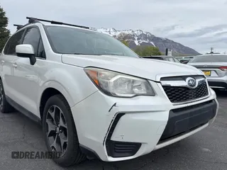2014 Subaru Forester 2.0XT Premium with VIN JF2SJGDC1EH477436, listed as a Copart auction lot 54798465 with 124,807 mi miles and Clean Title. Bid and sale history available at carsss.com. Image 1.