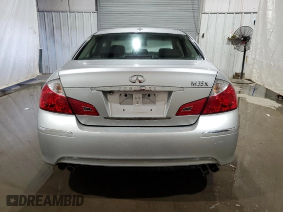 2009 Infiniti M with VIN JNKCY01F39M851190, listed as a Copart auction lot 64297164 with 221,933 mi miles and Salvage Title. Bid and sale history available at DreamBid. Image 6.