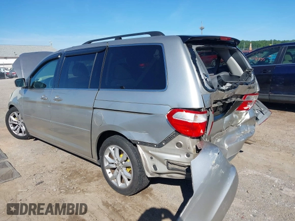 2005 Honda Odyssey EX z VIN 5FNRL38465B411189, wystawiony jako IAAI lot #42310199 z przebiegiem 304 142 mil mil oraz . Historia ofert i sprzedaży dostępna na DreamBid. Obrazek 6.