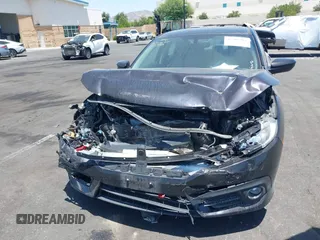 2017 Honda Civic EX-L с VIN 2HGFC1F78HH636069, выставлен на аукционе IAAI как лот 42489304 с пробегом 97 876 миль миль и . История ставок и продаж доступна на DreamBid. Изображение 12.