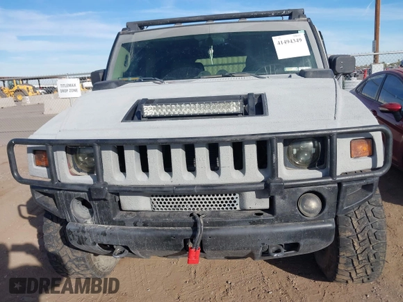 2003 Hummer H2 with VIN 5GRGN23U13H128617, listed as a IAAI auction lot 41494349 with 135,295 mi miles. Bid and sale history available at carsss.com. Image 6.