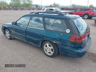 1999 Subaru Legacy L z VIN 4S3BK4355X6305664, wystawiony jako IAAI lot #42077758 z przebiegiem 70 585 mil mil oraz . Historia ofert i sprzedaży dostępna na DreamBid. Obrazek 3.