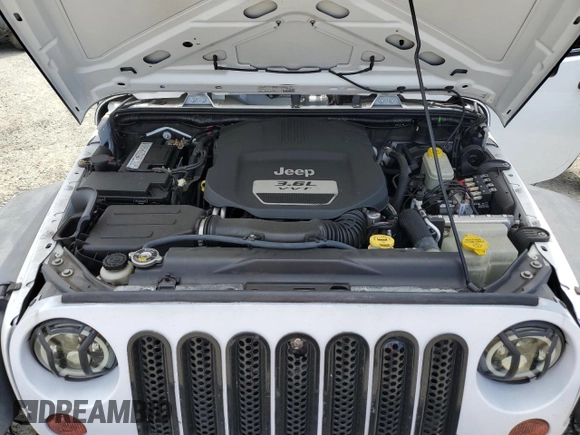 2013 Jeep Wrangler Unlimited Sport with VIN 1C4BJWDG8DL639781, listed as a Copart auction lot 63620025 with 84,720 mi miles and Salvage title. Bid and sale history available at DreamBid. Image 11.