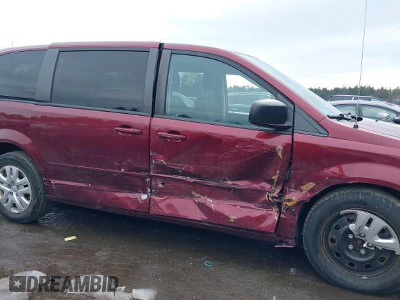 2017 Dodge Grand Caravan SE z VIN 2C4RDGBG8HR793970, wystawiony jako IAAI lot #41691933 z przebiegiem 107 055 mil mil oraz . Historia ofert i sprzedaży dostępna na DreamBid. Obrazek 6.