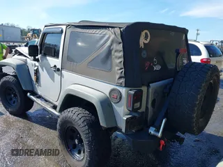 2011 Jeep Wrangler Rubicon with VIN 1J4BA6D10BL514776, listed as a IAAI auction lot 41487396 with 172,208 mi miles. Bid and sale history available at carsss.com. Image 3.