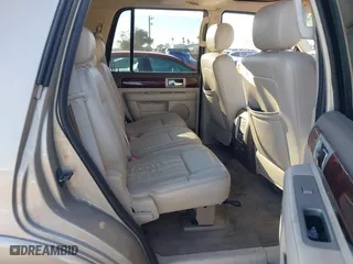 2004 Lincoln Navigator Luxury with VIN 5LMFU27R14LJ42966, listed as a IAAI auction lot 41614278 with 203,785 mi miles. Bid and sale history available at carsss.com. Image 8.