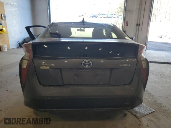 2016 Toyota Prius Four z VIN JTDKARFU2G3508628, wystawiony jako Copart lot #54727495 z przebiegiem Nie podano mil oraz Szkoda całkowita • Salvage title. Historia ofert i sprzedaży dostępna na DreamBid. Obrazek 6.