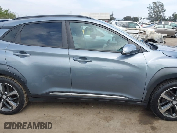 2019 Hyundai Kona Ultimate with VIN KM8K53A58KU198498, listed as a IAAI auction lot 42046679 with 57,327 mi miles and . Bid and sale history available at carsss.com. Image 14.
