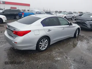2014 Infiniti Q50 Premium with VIN JN1BV7AP3EM674645, listed as a IAAI auction lot 41941054 with 77,270 mi miles. Bid and sale history available at carsss.com. Image 4.