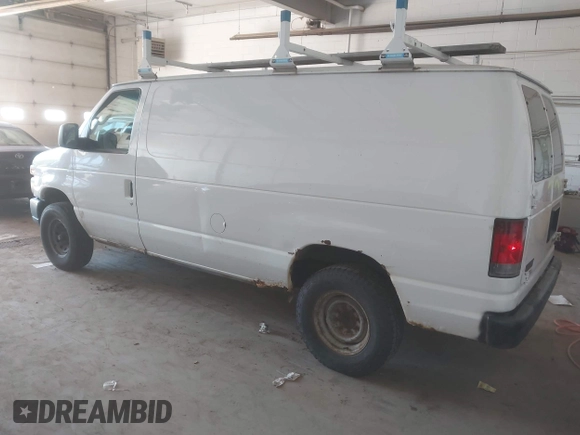 2011 Ford Econoline Cargo Commercial with VIN 1FTNE2EW9BDB11058, listed as a IAAI auction lot 42202069 with 282,179 mi miles. Bid and sale history available at carsss.com. Image 3.
