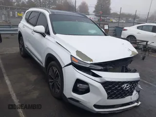 2019 Hyundai Santa Fe Ultimate with VIN 5NMS5CAA3KH036089, listed as a IAAI auction lot 40810710 with 62,561 mi miles and . Bid and sale history available at DreamBid. Image 1.