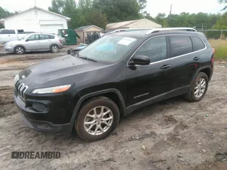 2014 Jeep Cherokee Latitude with VIN 1C4PJLCB1EW231178, listed as a IAAI auction lot 42128894 with 121,412 mi miles. Bid and sale history available at carsss.com. Image 17.