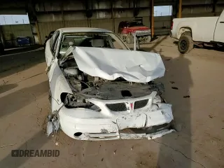 2004 Pontiac Grand Am SE1 with VIN 1G2NF52E24C147066, listed as a Copart auction lot 84556084 with 138,490 mi miles and Salvage Title. Bid and sale history available at carsss.com. Image 11.