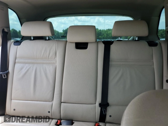 2012 BMW X5 35i с VIN 5UXZV4C58CL987049, выставлен на аукционе Copart как лот 61013925 с пробегом 167 508 миль миль и Чистый • Clean title. История ставок и продаж доступна на DreamBid. Изображение 10.