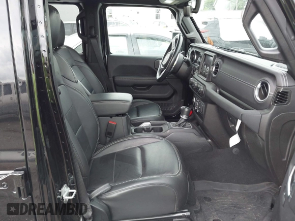 2022 Jeep Gladiator High Altitude with VIN 1C6HJTFG8NL168519, listed as a IAAI auction lot 42439845 with 16,786 mi miles and . Bid and sale history available at DreamBid. Image 5.