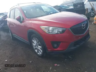 2015 Mazda CX-5 Grand Touring with VIN JM3KE2DY5F0502833, listed as a IAAI auction lot 41856532 with 79,400 mi miles. Bid and sale history available at carsss.com. Image 1.