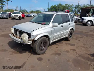 2002 Suzuki Grand Vitara with VIN JS3TE62VX24154173, listed as a IAAI auction lot 41711181 with 224,024 mi miles. Bid and sale history available at carsss.com. Image 18.