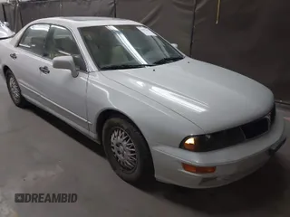 1999 Mitsubishi Diamante z VIN 6MMAP47P4XT003895, wystawiony jako IAAI lot #41992452 z przebiegiem 170 964 mil mil oraz . Historia ofert i sprzedaży dostępna na DreamBid. Obrazek 1.