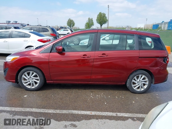 2012 Mazda 5 Sport with VIN JM1CW2BL9C0107471, listed as a IAAI auction lot 42021285 with 104,851 mi miles. Bid and sale history available at carsss.com. Image 14.
