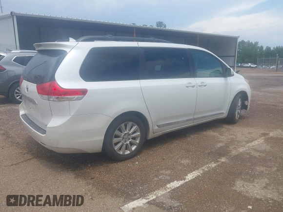 2014 Toyota Sienna XLE with VIN 5TDYK3DC2ES517663, listed as a IAAI auction lot 42171862 with 143,447 mi miles and . Bid and sale history available at DreamBid. Image 4.