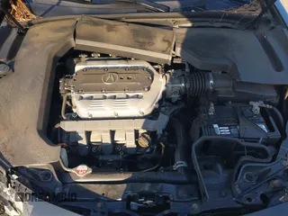 2012 Acura TL Tech Auto with VIN 19UUA8F50CA025948, listed as a IAAI auction lot 41723890 with 203,424 mi miles. Bid and sale history available at carsss.com. Image 10.