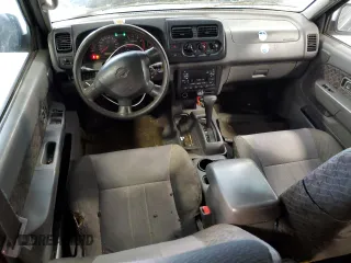 2001 Nissan Xterra XE with VIN 5N1ED28T41C558773, listed as a Copart auction lot 51029065 with 312,254 mi miles and Clean Title. Bid and sale history available at DreamBid. Image 8.