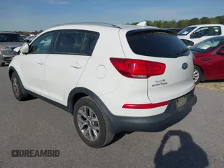 2015 Kia Sportage LX with VIN KNDPB3AC3F7742718, listed as a IAAI auction lot 41877257 with 215,101 mi miles and . Bid and sale history available at carsss.com. Image 3.
