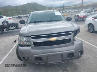 2007 Chevrolet Tahoe LT z VIN 1GNFC13J07J122414, wystawiony jako IAAI lot #39134539 z przebiegiem Nie podano mil oraz . Historia ofert i sprzedaży dostępna na DreamBid. Obrazek 11.