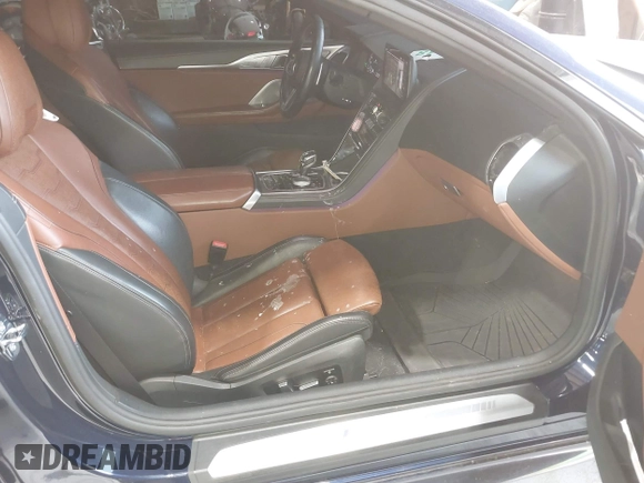 2023 BMW 8 Series with VIN WBAFY4C07PCM50546, listed as a IAAI auction lot 42403241 with 15,697 mi miles and . Bid and sale history available at DreamBid. Image 5.