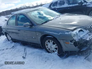 2004 Mercury Sable LS Premium with VIN 1MEFM55S04A619587, listed as a IAAI auction lot 41571950 with 125,444 mi miles and . Bid and sale history available at DreamBid. Image 13.
