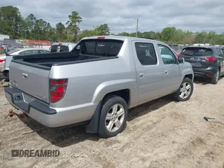 2014 Honda Ridgeline RTL with VIN 5FPYK1F53EB013752, listed as a IAAI auction lot 41886851 with 89,038 mi miles and . Bid and sale history available at DreamBid. Image 4.