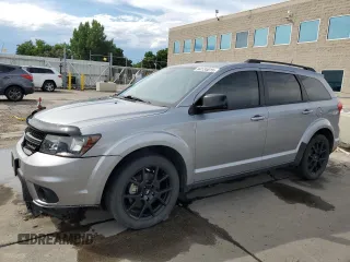 2018 Dodge Journey SXT with VIN 3C4PDDBG9JT243976, listed as a Copart auction lot 64134815 with 70,410 mi miles and Salvage title. Bid and sale history available at DreamBid. Image 1.