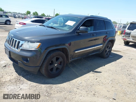 2011 Jeep Grand Cherokee Laredo with VIN 1J4RR4GG7BC715778, listed as a IAAI auction lot 42313636 with 249,209 mi miles and . Bid and sale history available at DreamBid. Image 2.