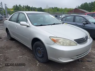 2004 Toyota Camry LE with VIN JTDBE32KX40270367, listed as a IAAI auction lot 42280362 with 129,234 mi miles and . Bid and sale history available at DreamBid. Image 1.