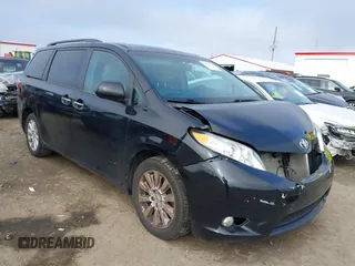 2015 Toyota Sienna Ltd with VIN 5TDDK3DC2FS116159, listed as a IAAI auction lot 41137819 with 164,864 mi miles. Bid and sale history available at carsss.com. Image 1.