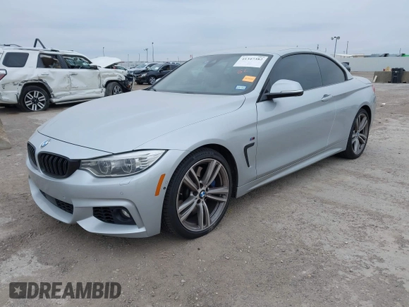 2014 BMW 4 Series 435i z VIN WBA3T3C55EP737428, wystawiony jako IAAI lot #41347382 z przebiegiem 129 513 mil mil oraz . Historia ofert i sprzedaży dostępna na DreamBid. Obrazek 6.