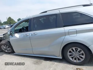 2021 Toyota Sienna LE with VIN 5TDKRKEC5MS010782, listed as a IAAI auction lot 42272827 with 196,844 mi miles and . Bid and sale history available at DreamBid. Image 14.