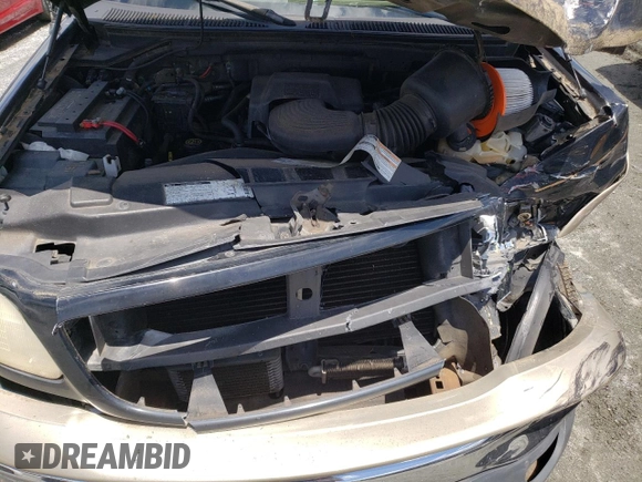 2000 Ford F-150 XL z VIN 1FTRX18L7YNB44005, wystawiony jako Copart lot #56535195 z przebiegiem 187 429 mil mil oraz Szkoda całkowita • Salvage title. Historia ofert i sprzedaży dostępna na DreamBid. Obrazek 11.