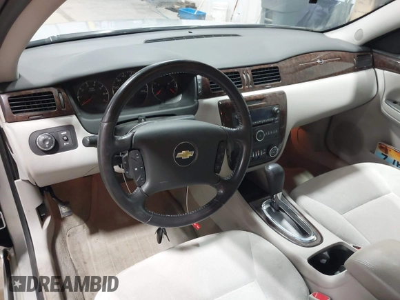 2014 Chevrolet Impala LT with VIN 2G1WB5E37E1178089, listed as a IAAI auction lot 42450127 with 58,277 mi miles and . Bid and sale history available at DreamBid. Image 17.