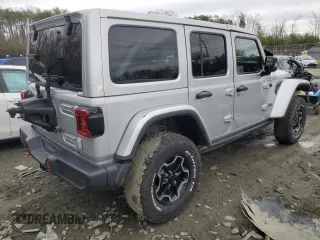 2023 Jeep Wrangler Rubicon Farout with VIN 1C4JJXFM4PW589923, listed as a Copart auction lot 48181205 with 9,814 mi miles and Salvage title. Bid and sale history available at DreamBid. Image 3.