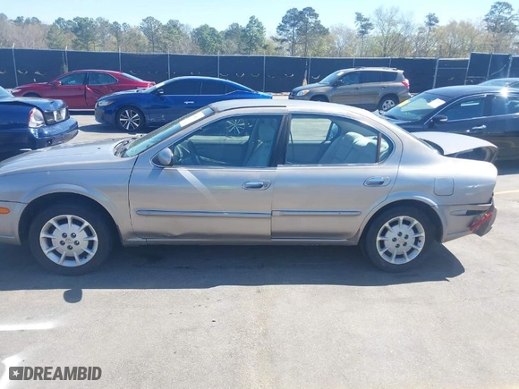 2000 Nissan Maxima GXE with VIN JN1CA31D8YT551822, listed as a IAAI auction lot 41845010 with 297,479 mi miles. Bid and sale history available at carsss.com. Image 14.