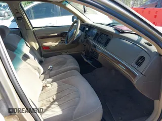 1999 Mercury Grand Marquis GS z VIN 2MEFM74W6XX626426, wystawiony jako IAAI lot #42231219 z przebiegiem 121 406 mil mil oraz . Historia ofert i sprzedaży dostępna na DreamBid. Obrazek 5.