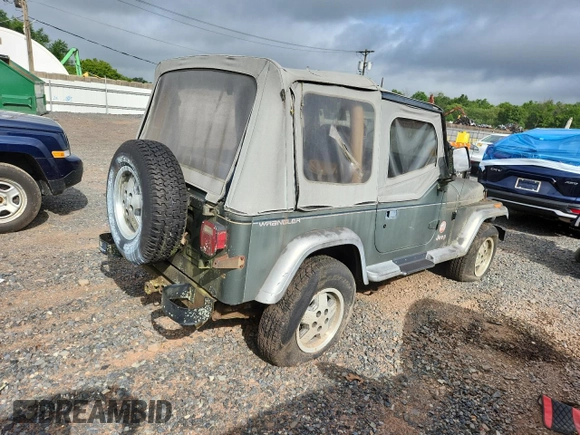 1992 Jeep Wrangler with VIN 2J4FY49S2NJ554502, listed as a Copart auction lot 63345035 with 113,897 mi miles and Clean title. Bid and sale history available at DreamBid. Image 3.